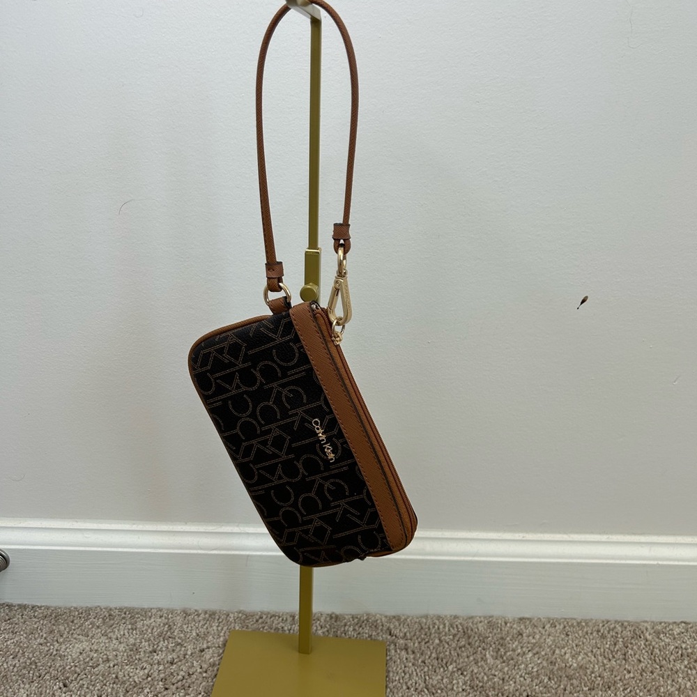 Calvin Klein Black Monogram Wristlet with Brown Trim